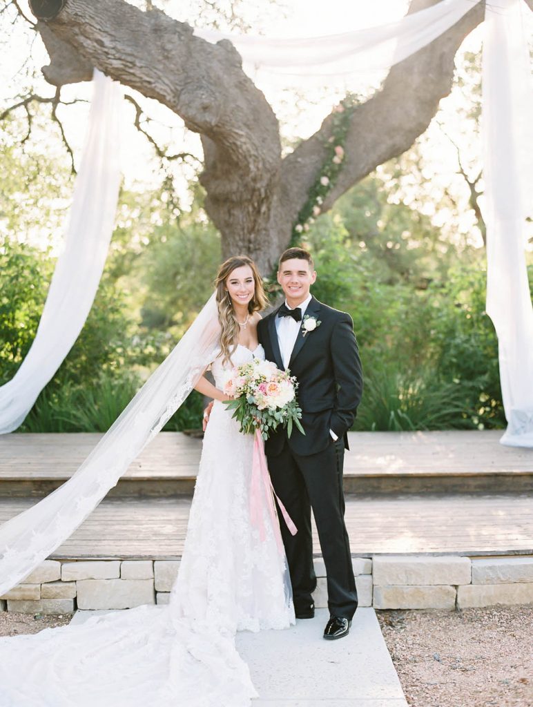 a classic bride and groom portrait at the altar