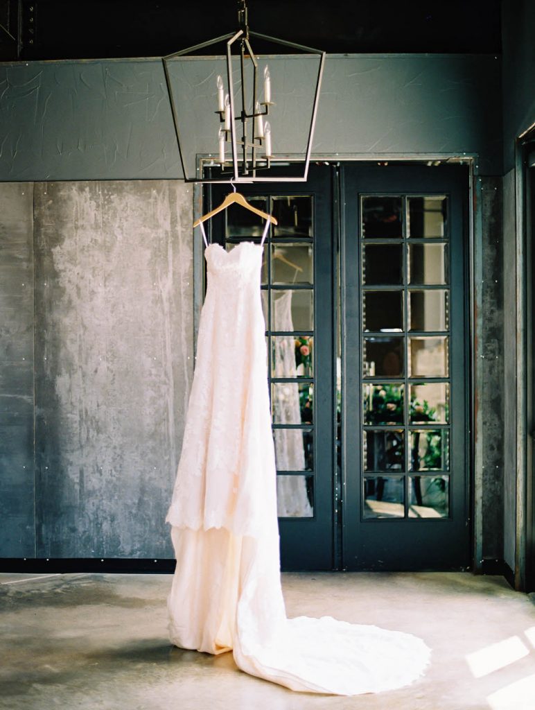 the bride's justin alexander dress hangs at park 31