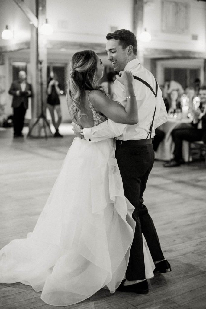 The bride and groom share their first dance
