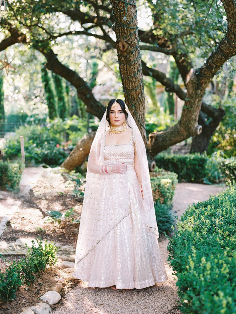 an indian bride in her lehenga