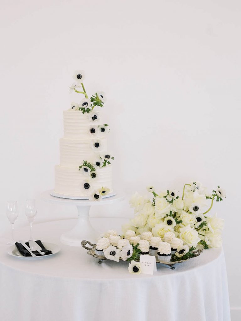 the minimal cake table with lots of poppies