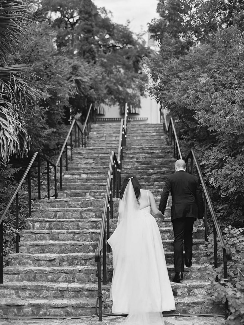 couple walking up stairs at laguna gloria