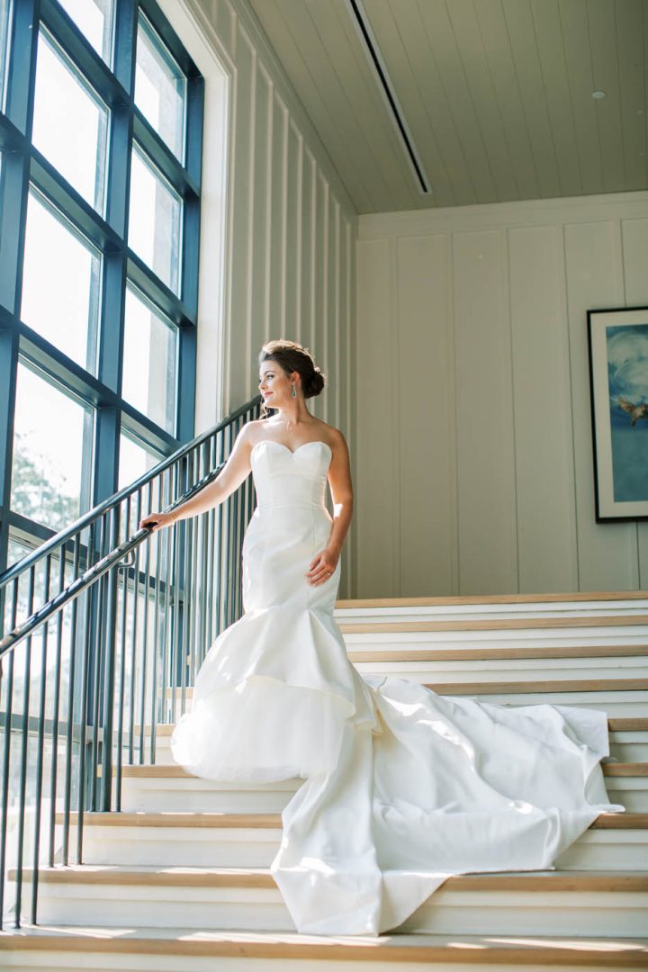 bride on the stairs of omni barton creek