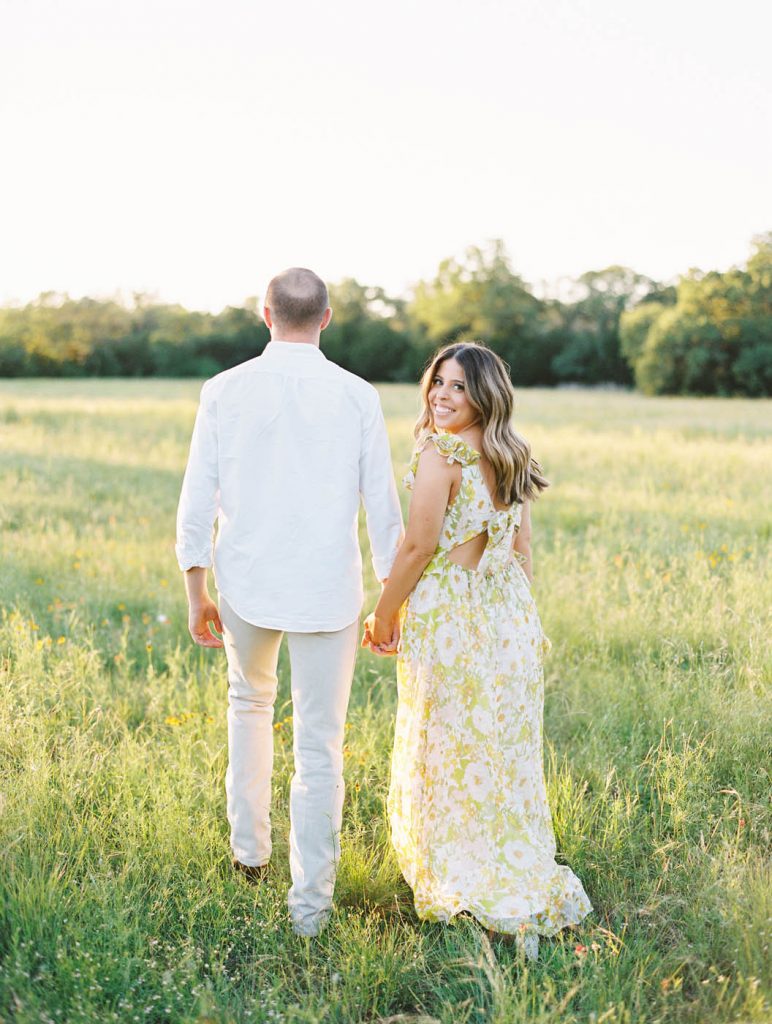 couple walking away during a portrait session in South Austin