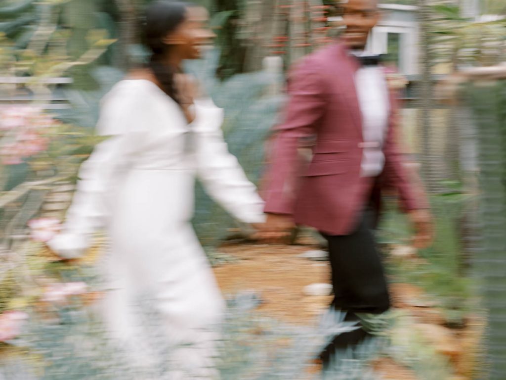 blurry photo of a married couple walking