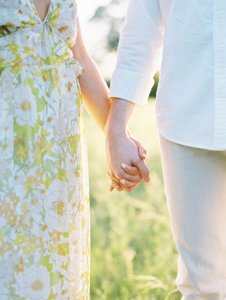 close up of holding hands for a portrait session at Circle C Park