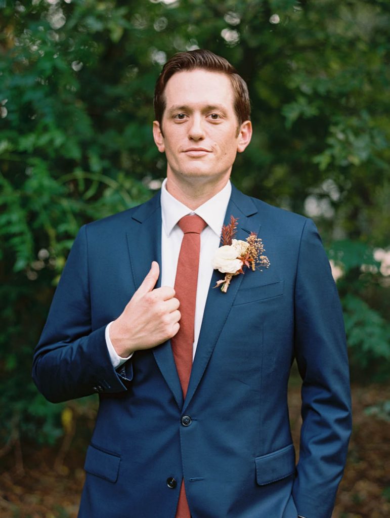 a formal portrait of the groom