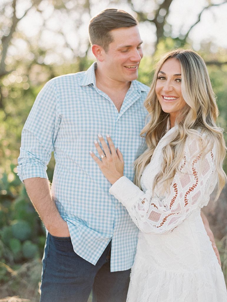 couple laughing together for engagement photos