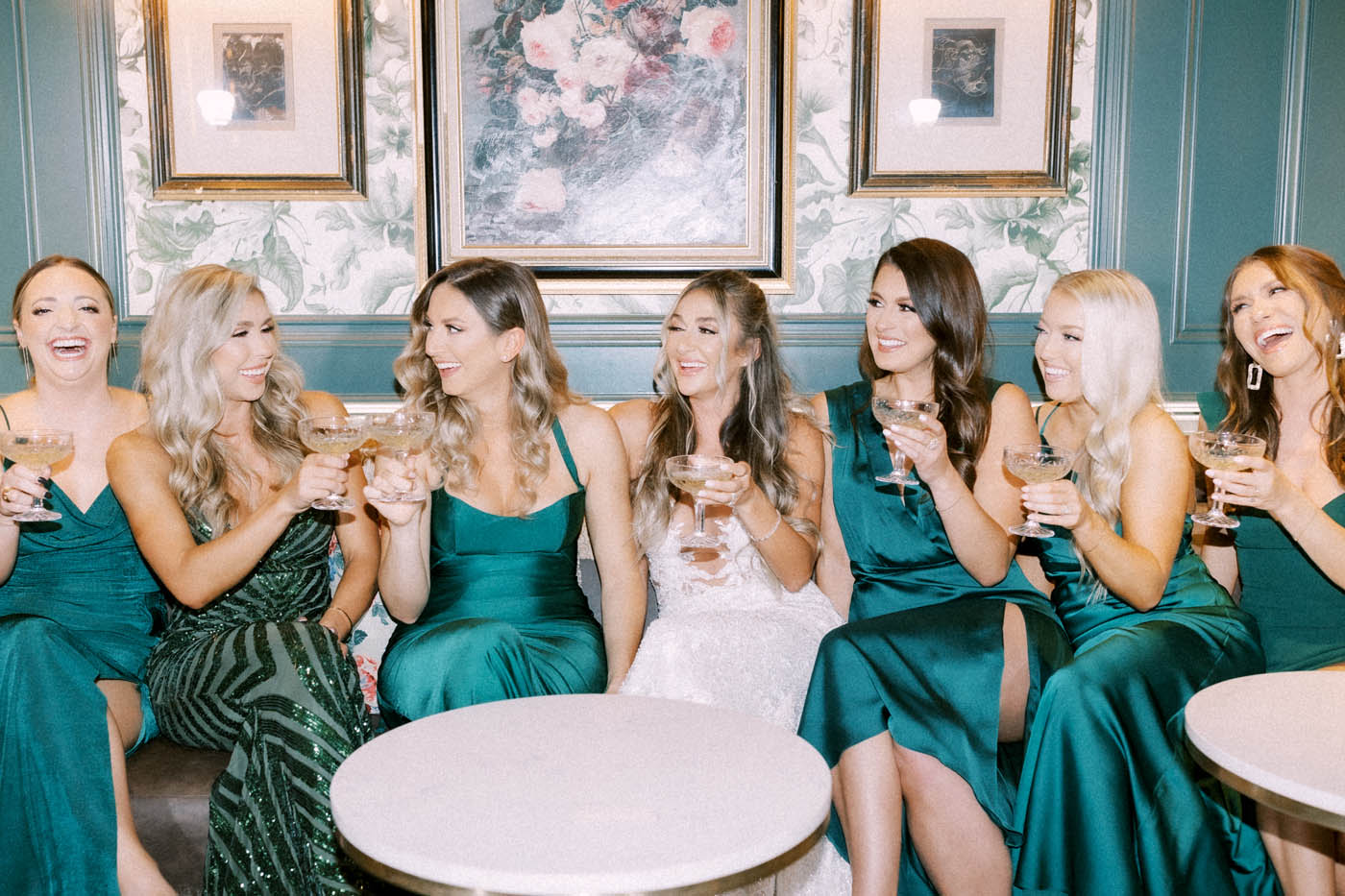 the bride shares a drink with her bridesmaids in the c baldwin hotel's ladies lounge