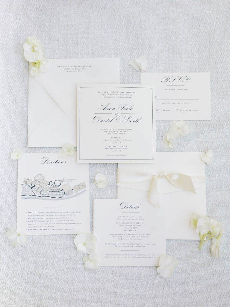 wedding invitation flatlay with paper by Design to Flourish