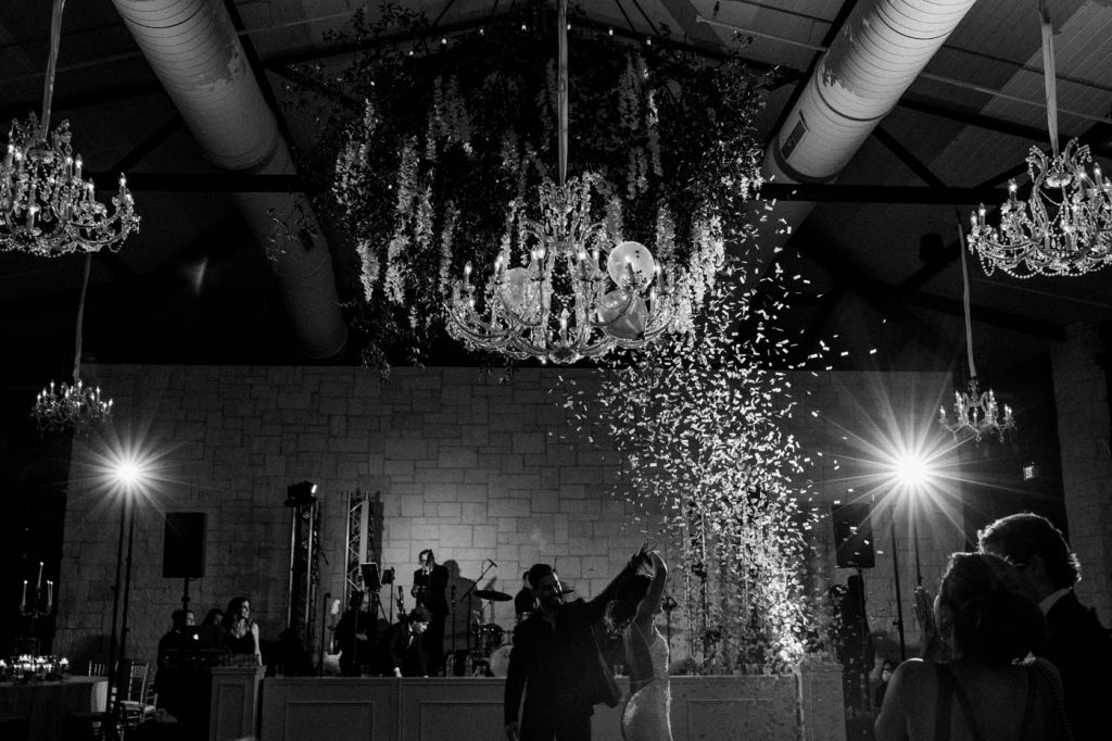 dramatic photo of the confetti grand finale at omni barton creek