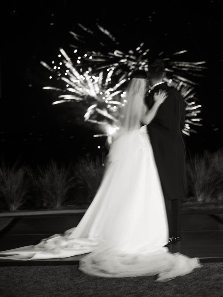 film photo of the bride and groom enjoying fireworks at omni barton creek
