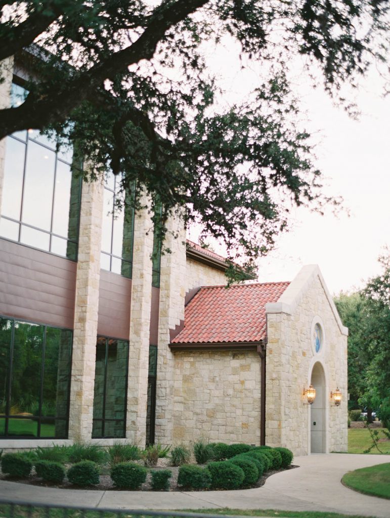 exterior photo of saint john neumann church in austin