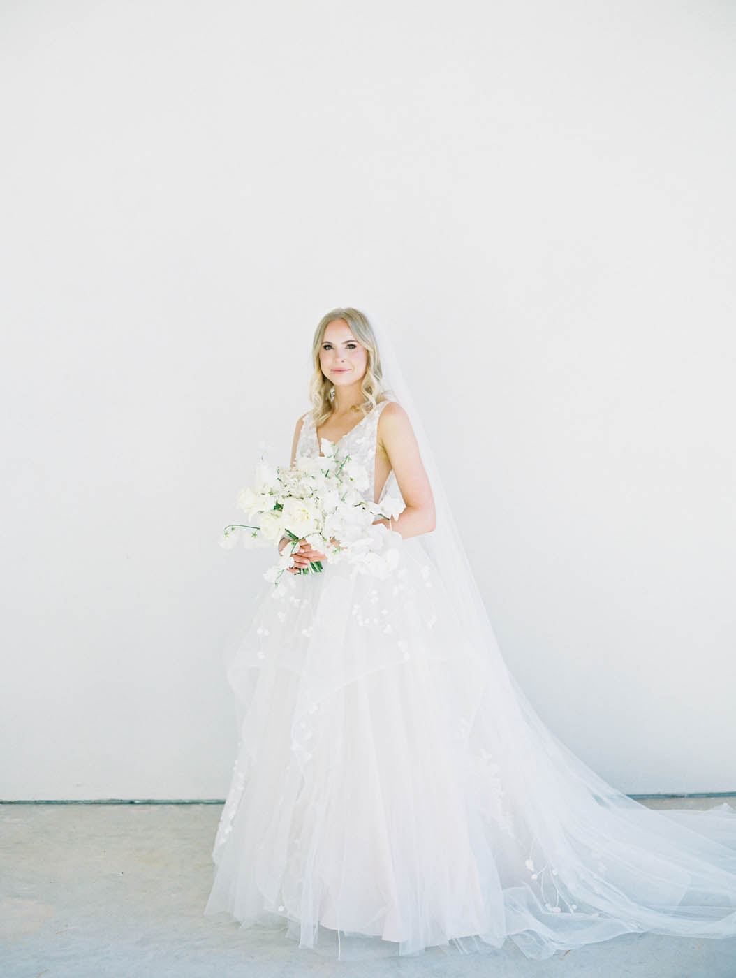 a full length classic minimal bridal portrait